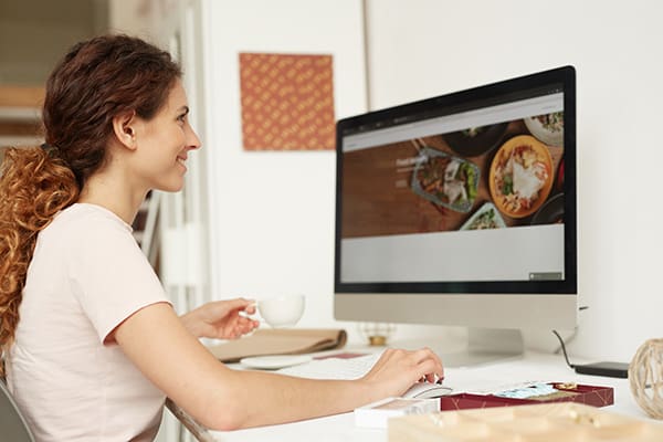10 Web Design Mistakes to Avoid in 2024 3 Website designer avoiding web design mistakes.